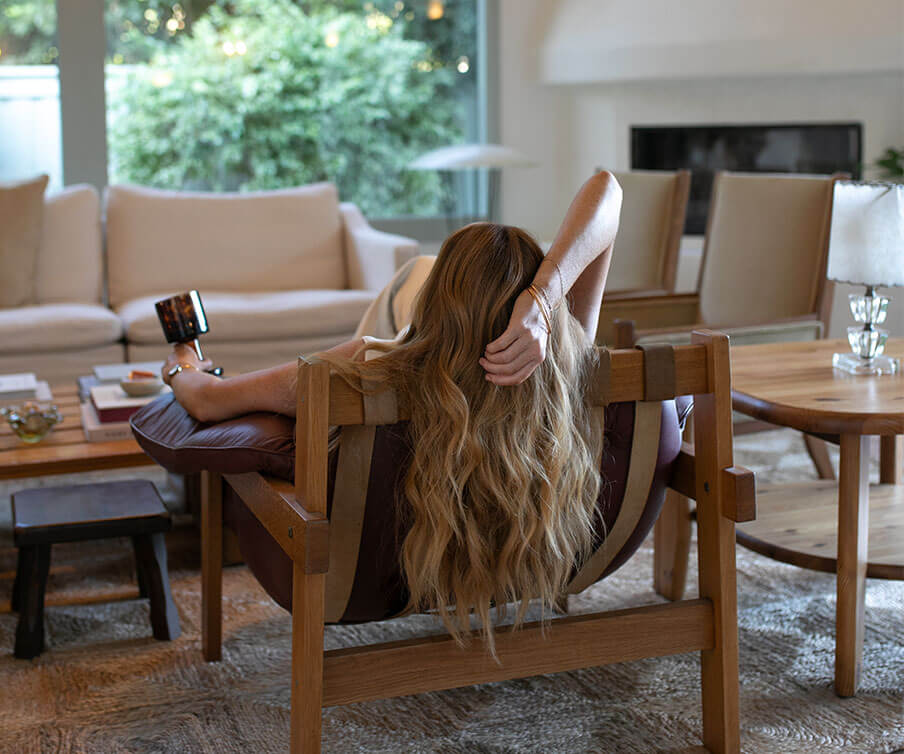 person laying in chair